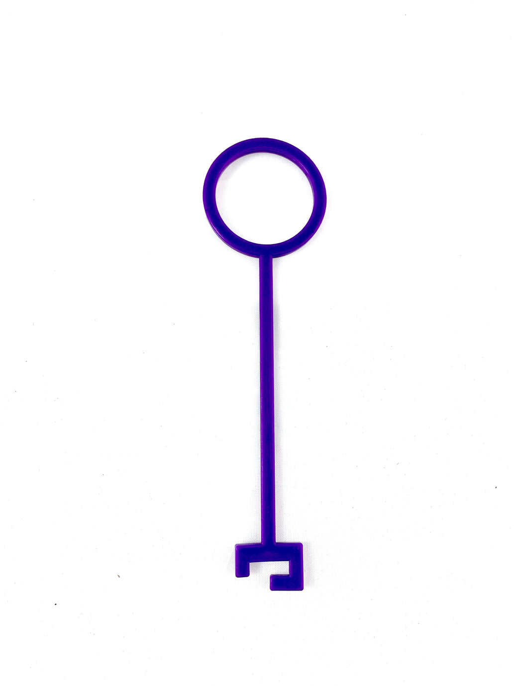 A Purple Clay Pigeon Hook by Yankee Thunder, featuring a circular head and a long, straight shaft with a notched tip, crafted from durable polymer, set against a plain white background.